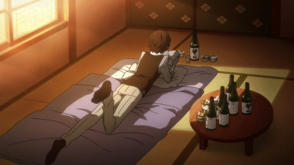 Gif of Dazai smiling.